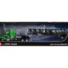 Peterbilt 389 with 48" Mid-Roof Sleeper and Polar Deep Drop Trailer Green and Silver 1/64 Diecast Model by DCP/First Gear